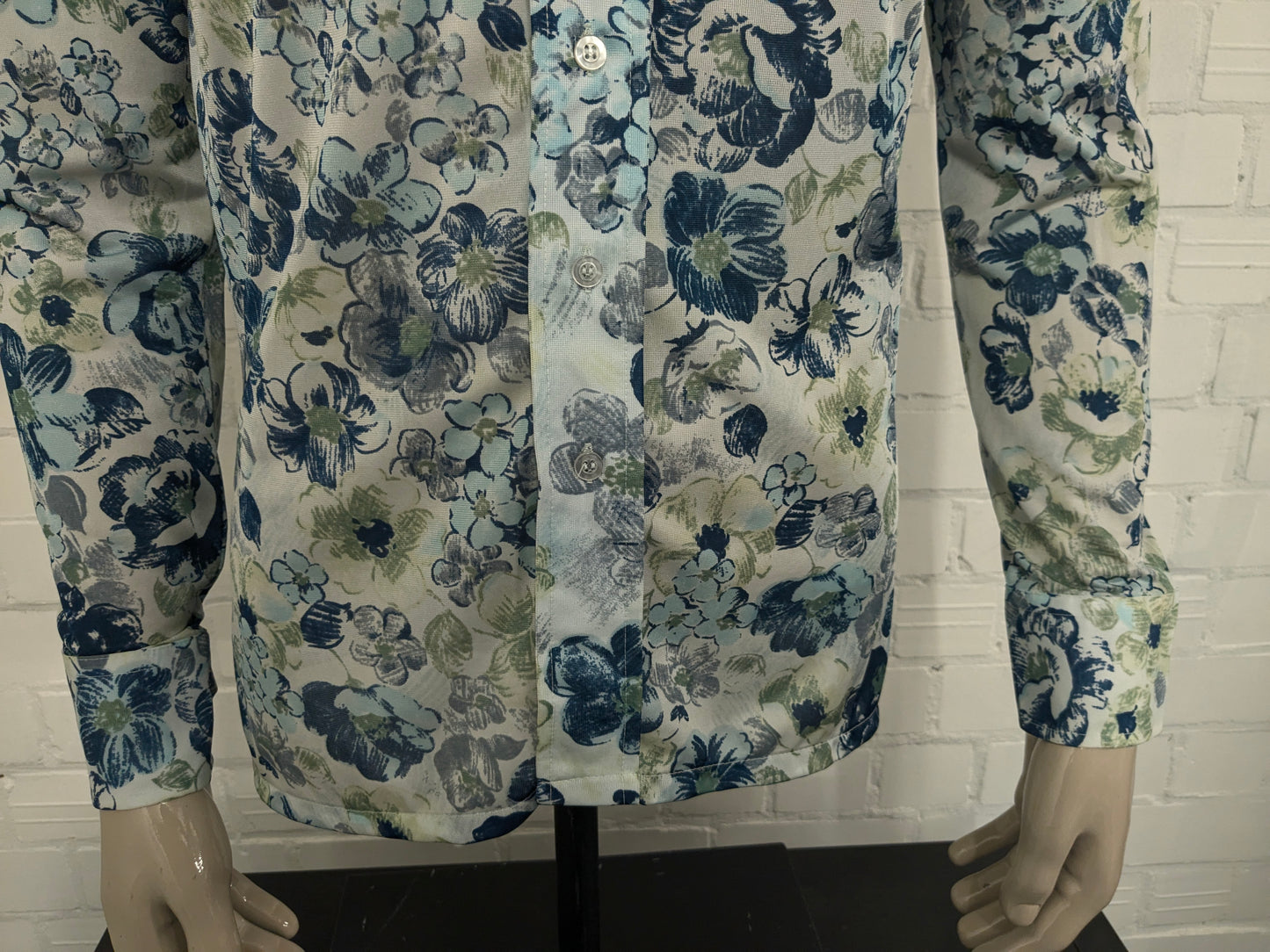 Vintage 70's cellini shirt with point collar. Blue green flowers print and slightly translucent. Size M.