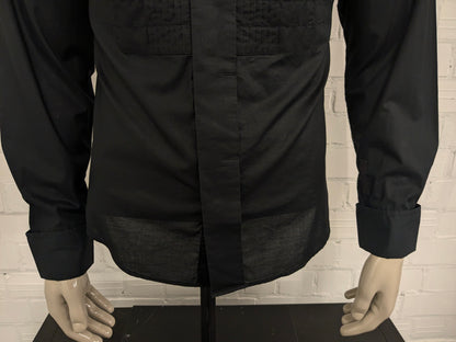 G-Star Raw shirt with a pleated front. Black colored. Size L.