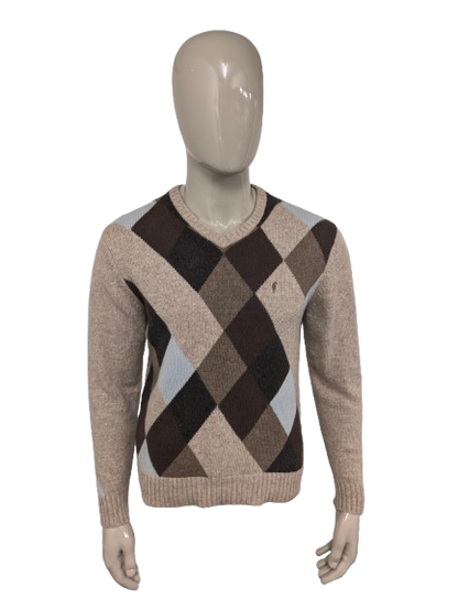 Signitore di lana da agricoltore vintage con scollo a V. Colorato blu marrone. Taglia M. 80% lana.