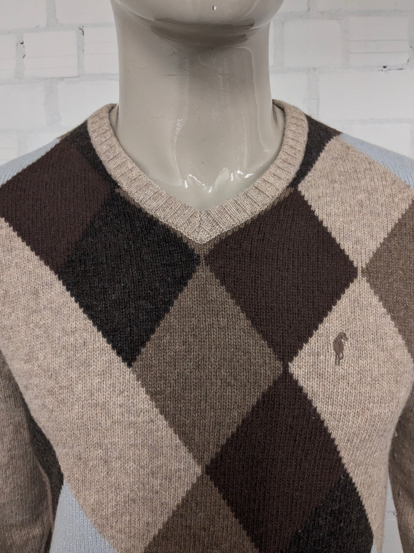 Signitore di lana da agricoltore vintage con scollo a V. Colorato blu marrone. Taglia M. 80% lana.