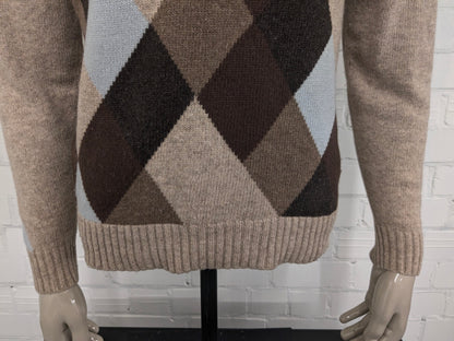 Signitore di lana da agricoltore vintage con scollo a V. Colorato blu marrone. Taglia M. 80% lana.