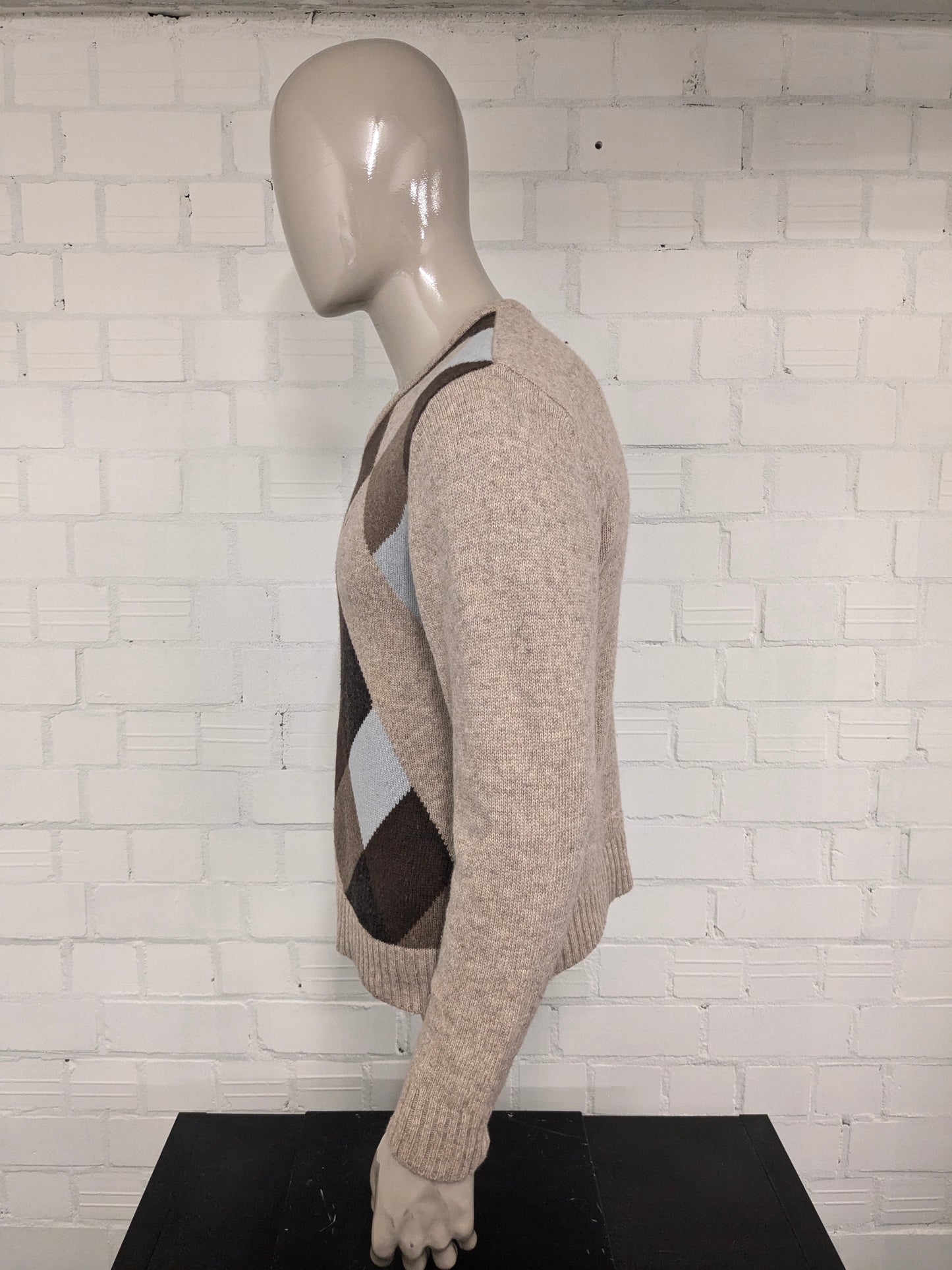 Signitore di lana da agricoltore vintage con scollo a V. Colorato blu marrone. Taglia M. 80% lana.