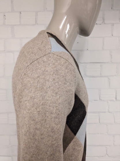 Signitore di lana da agricoltore vintage con scollo a V. Colorato blu marrone. Taglia M. 80% lana.