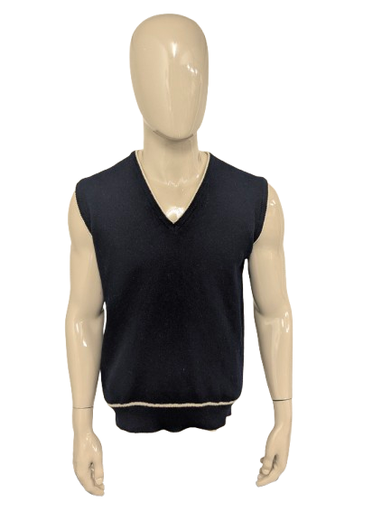 Vintage Canda LamsWollen spencer met V-Hals. Donker Blauw gekleurd. Maat M. 100% Wol.