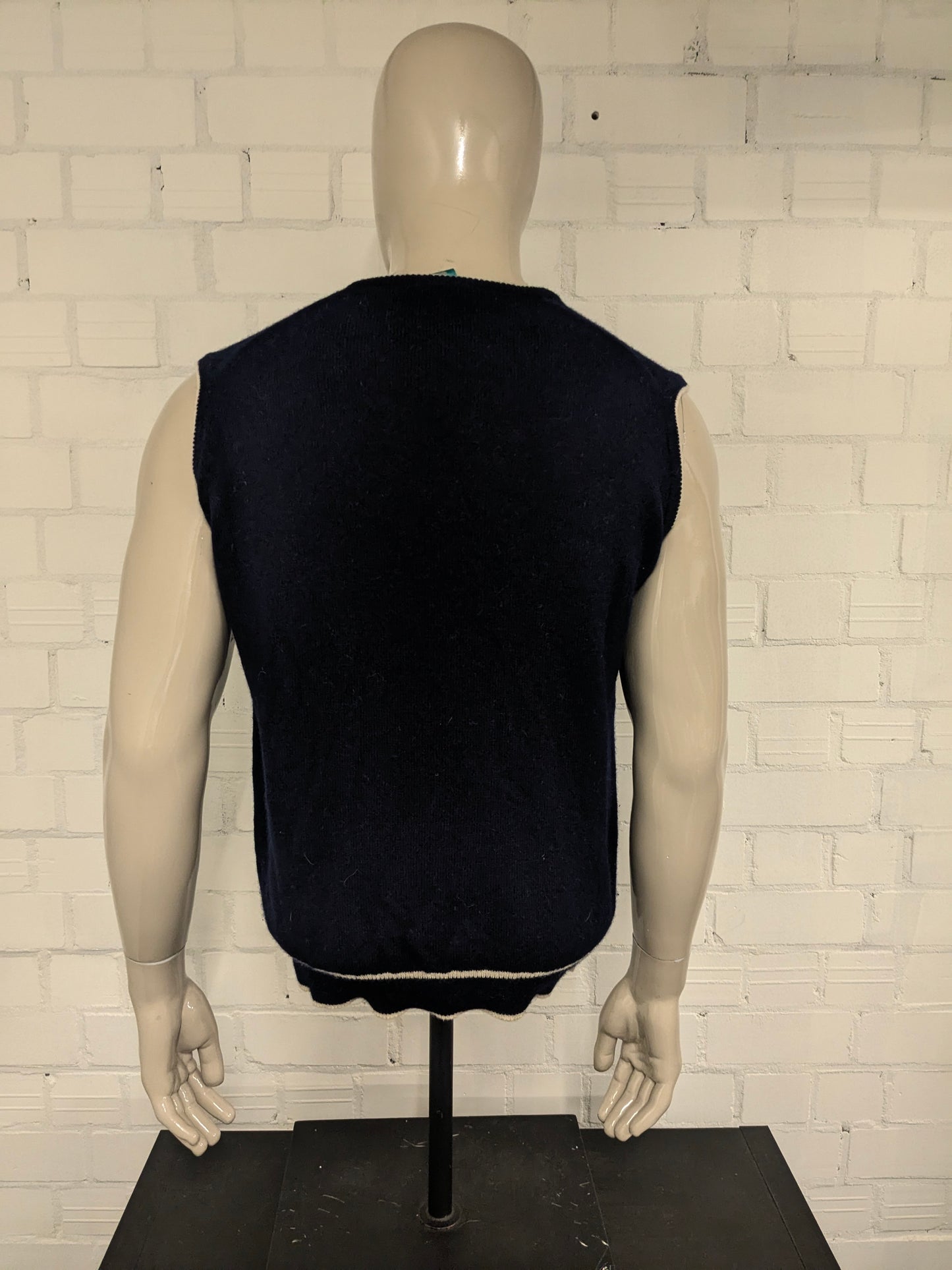 Vintage Canda LamsWollen spencer met V-Hals. Donker Blauw gekleurd. Maat M. 100% Wol.