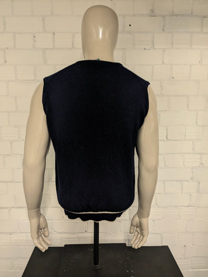 Vintage Canda LamsWollen spencer met V-Hals. Donker Blauw gekleurd. Maat M. 100% Wol.