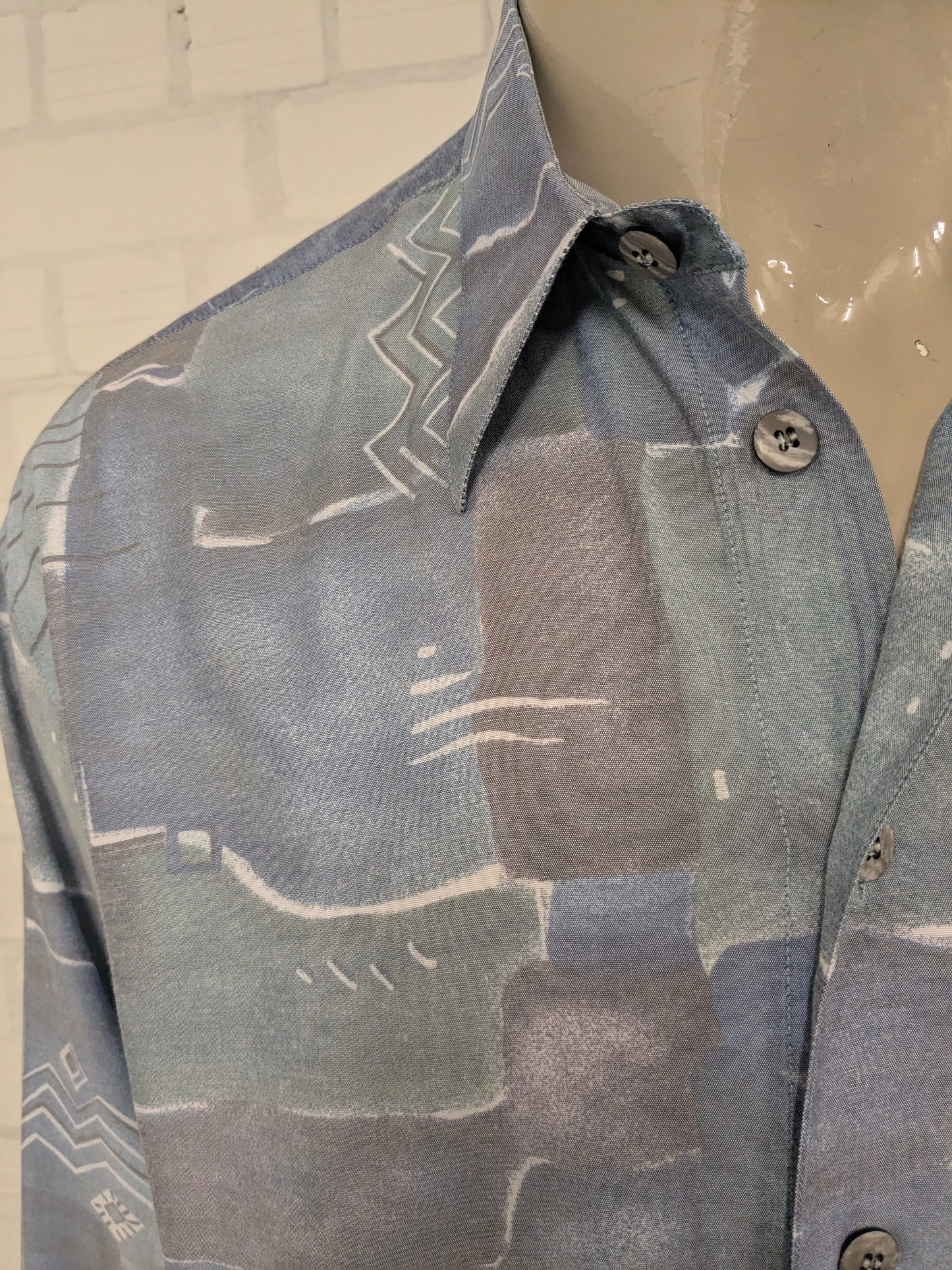 Shirt Nick Taylor des années 80-90 vintage. Impression gris vert bleu. Taille xl.