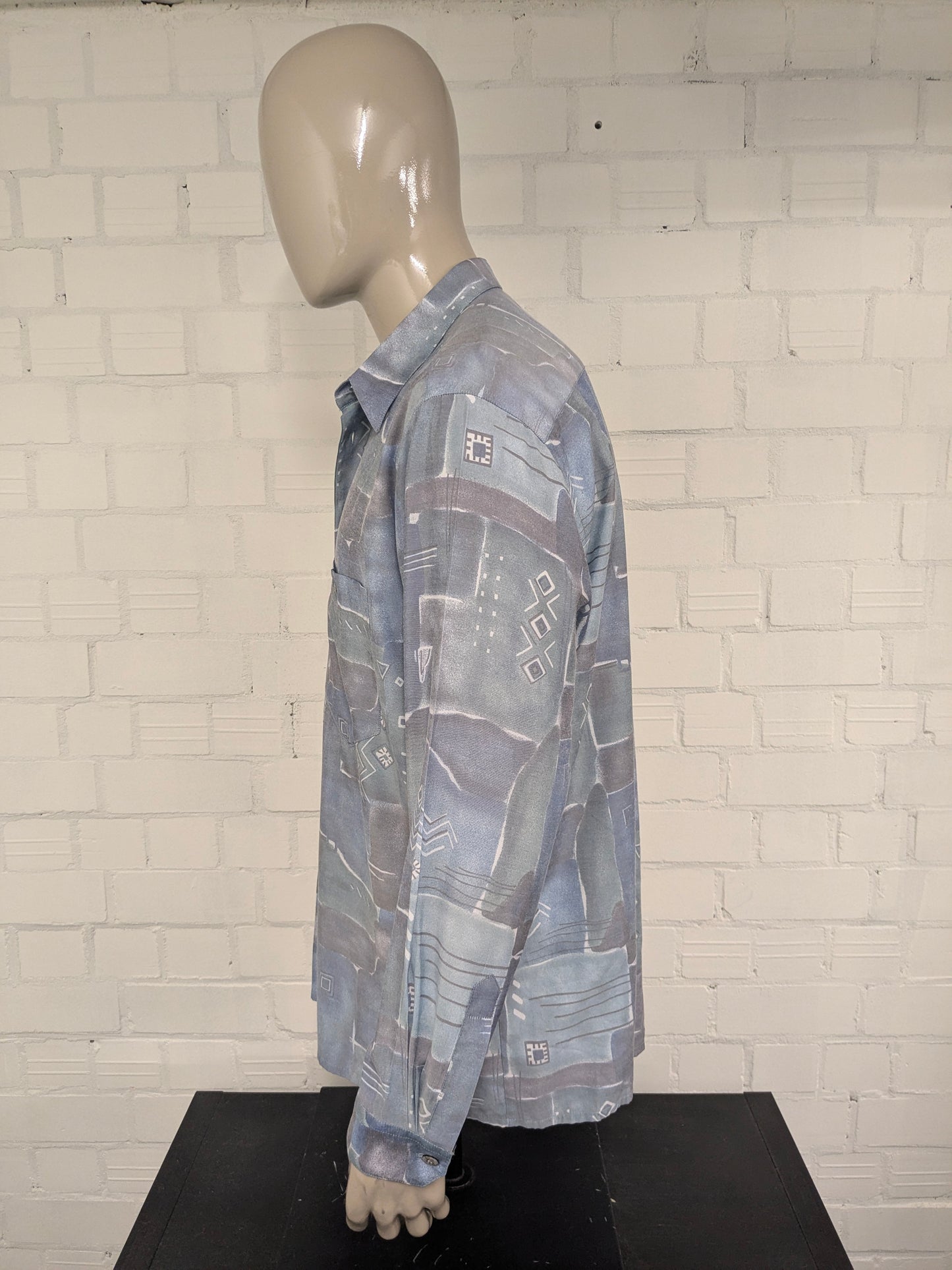 Shirt Nick Taylor des années 80-90 vintage. Impression gris vert bleu. Taille xl.