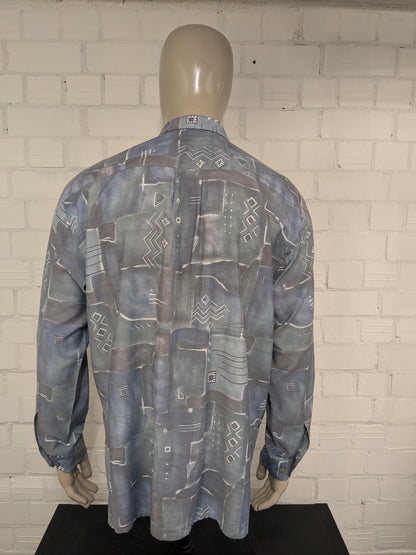 Shirt Nick Taylor des années 80-90 vintage. Impression gris vert bleu. Taille xl.