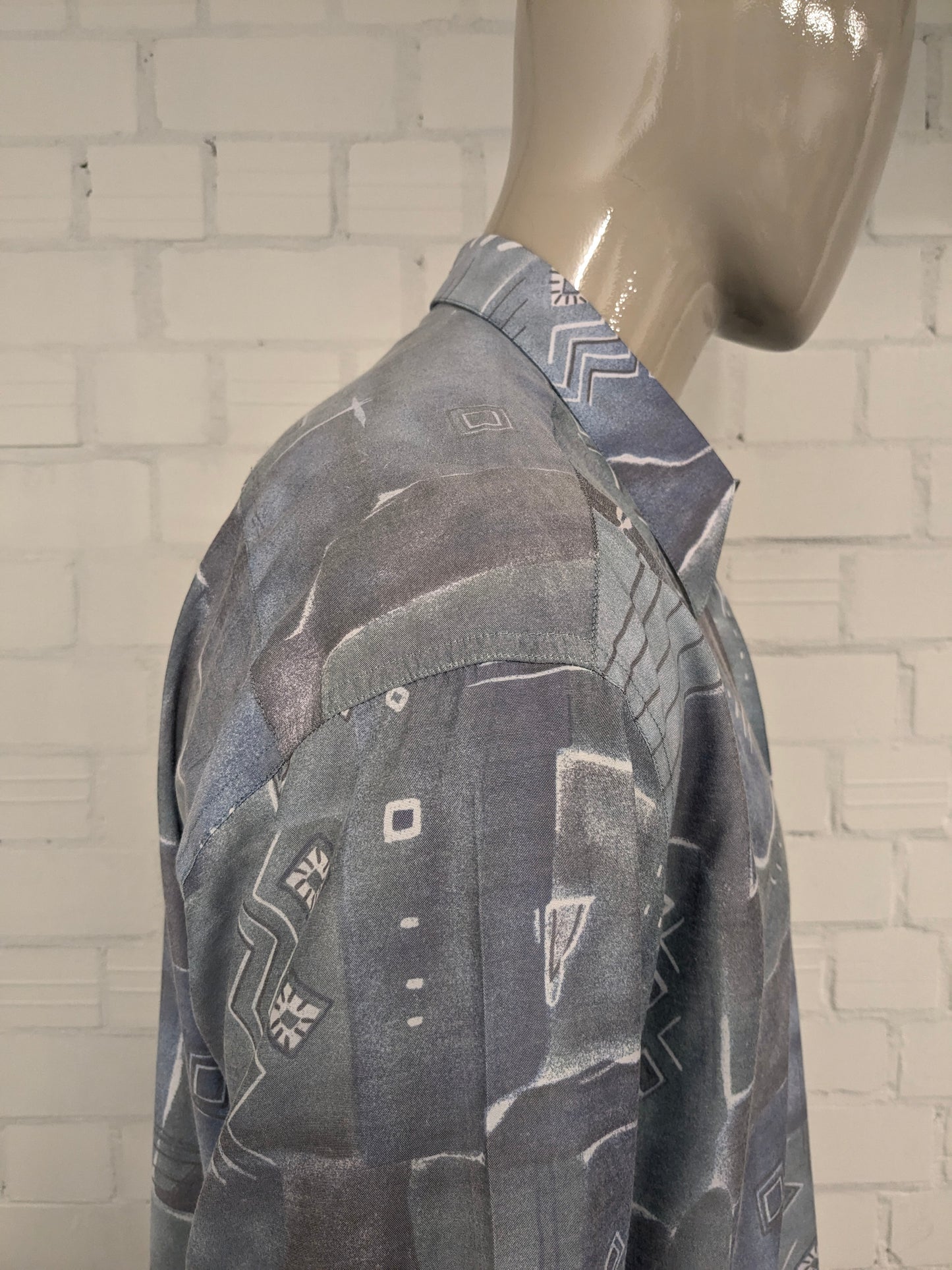 Shirt Nick Taylor des années 80-90 vintage. Impression gris vert bleu. Taille xl.