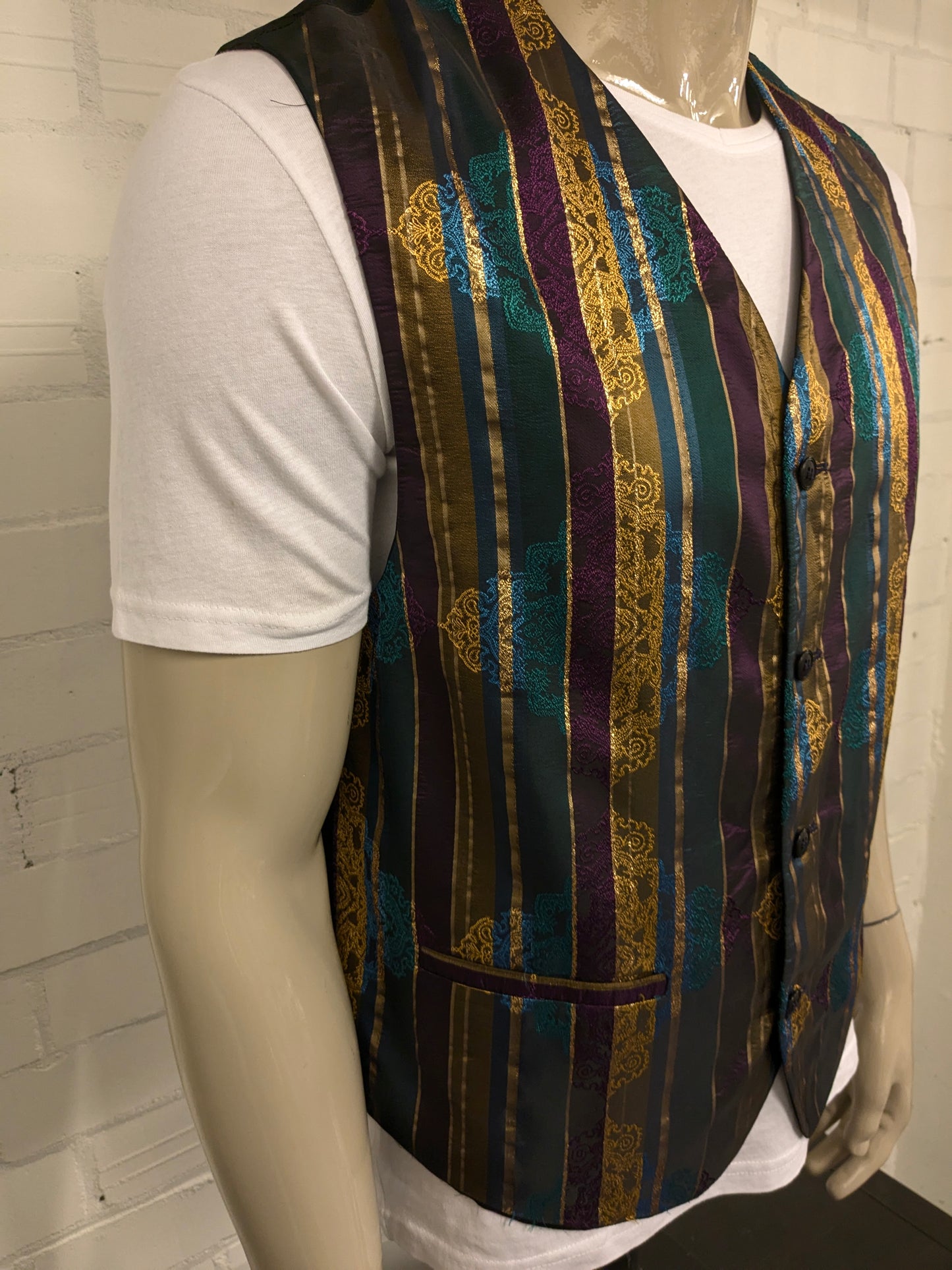 Gilet vintage whoopi. Motif brillant en or vert bleu violet -colore. Taille L.