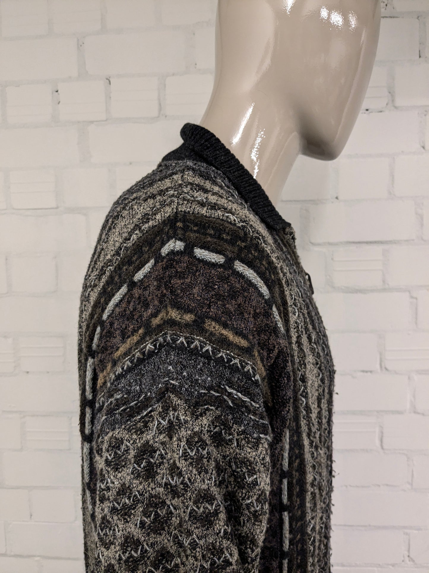 Pull vintage Monte Carlo Wool avec fermeture éclair. Couleur noir vert brun. Taille 2xl / xxl. 50% de laine.