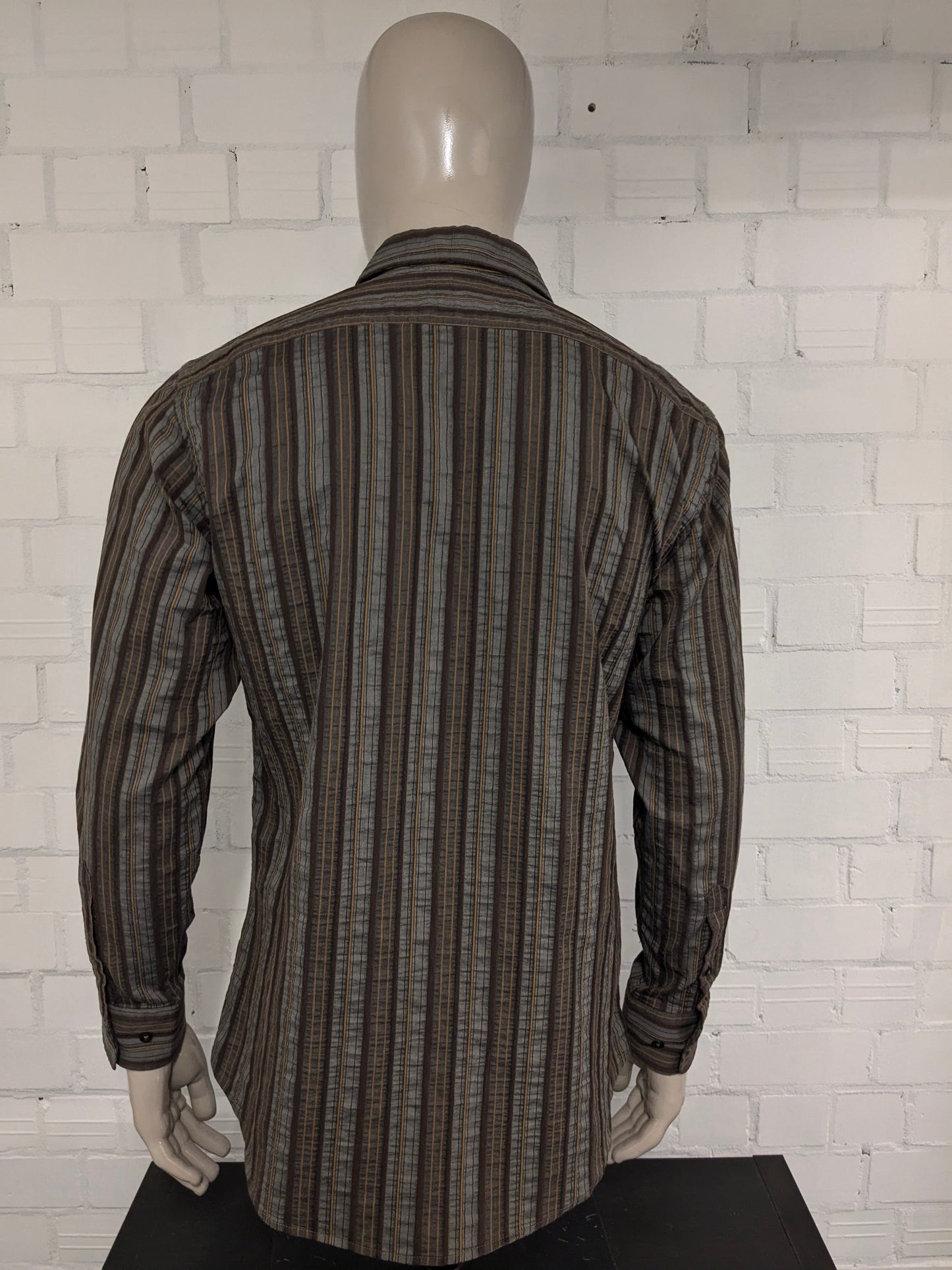 At company shirt. Gray brown black tangible striped motif. Size L.