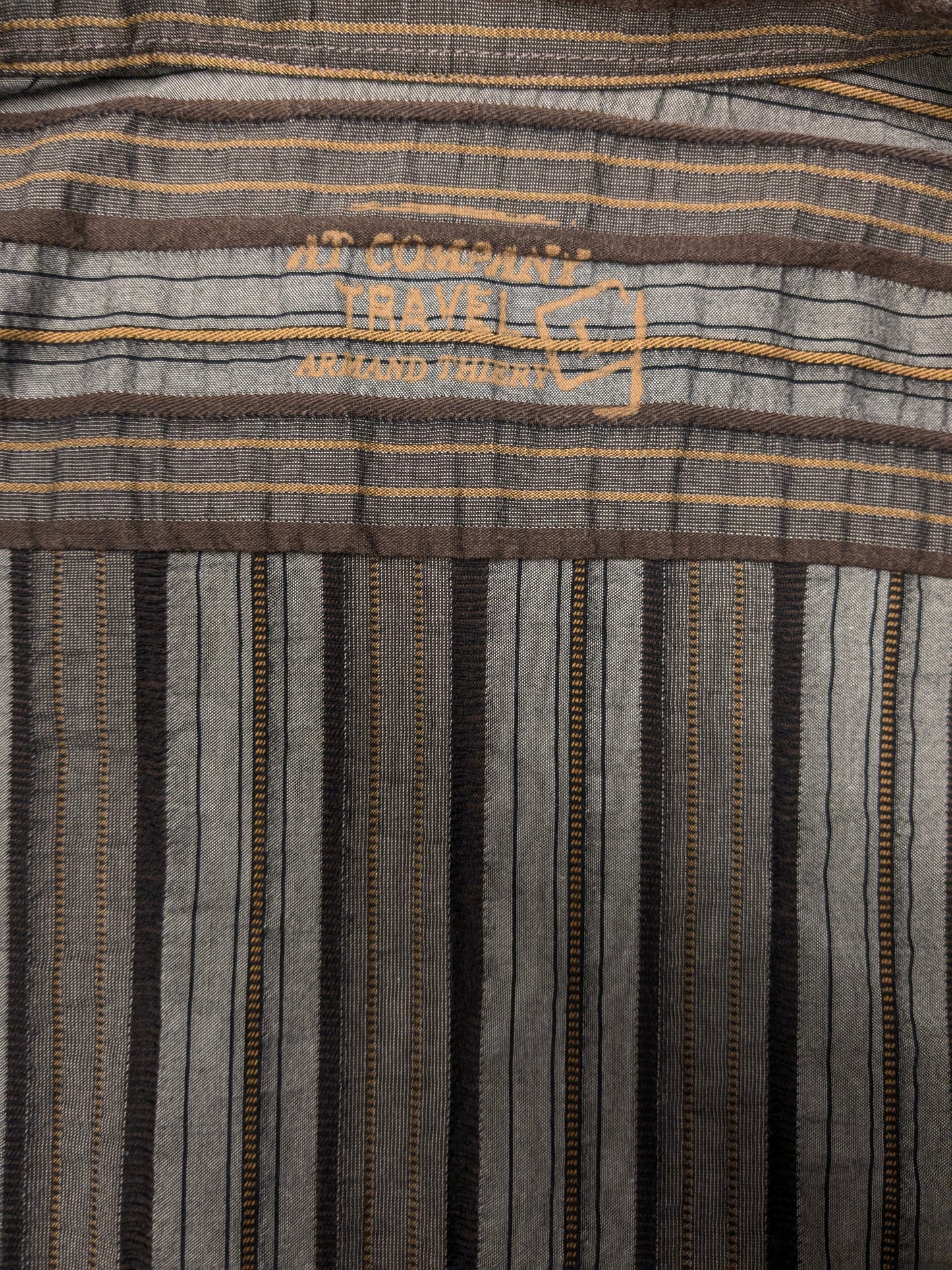 At company shirt. Gray brown black tangible striped motif. Size L.