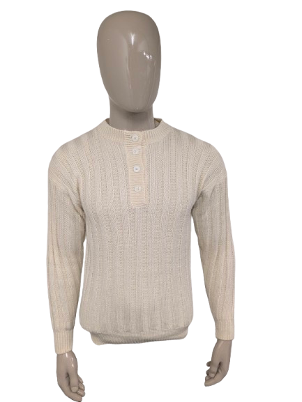 Vintage trui met knopen. Beige gekleurd. Maat M.