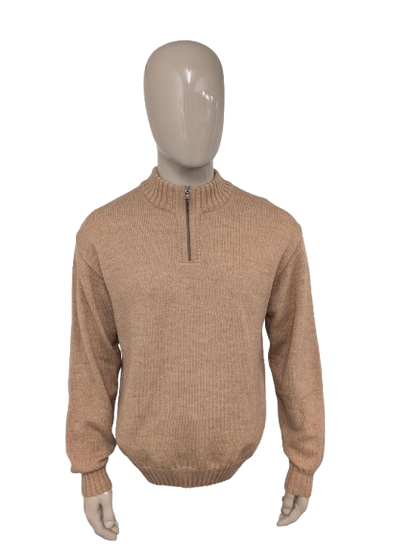 Pull en laine sans marque avec plaques à fermeture éclair et au coude. Brun clair mélangé. Taille L.