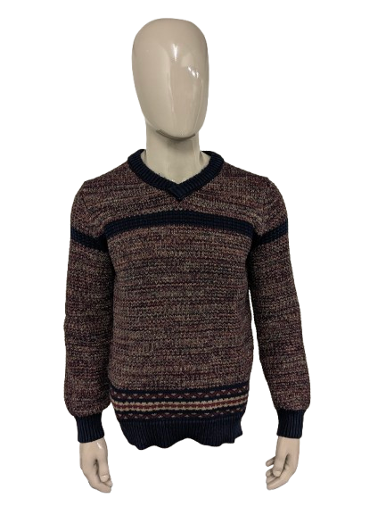 Pull en laine bleu Dansaert avec col en V. Kaki bleu rouge mélangé. Taille L. 10% de laine.