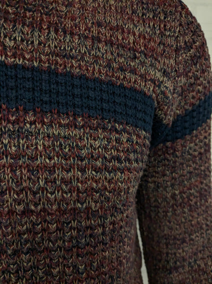 Pull en laine bleu Dansaert avec col en V. Kaki bleu rouge mélangé. Taille L. 10% de laine.