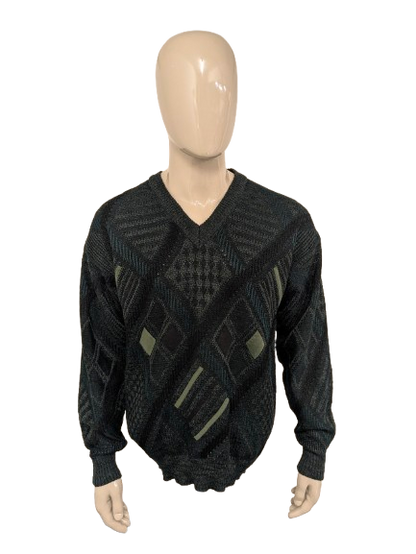 Vintage Angelo Litrico woolen sweater with V-neck. Green black colored. Size L. 8% wool.