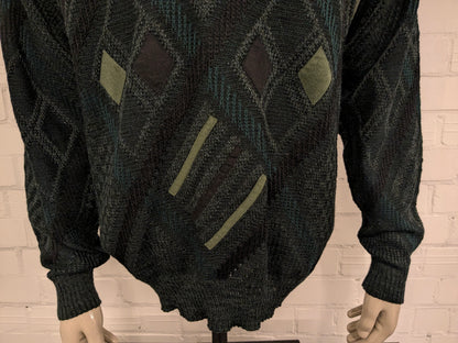 Vintage Angelo Litrico woolen sweater with V-neck. Green black colored. Size L. 8% wool.