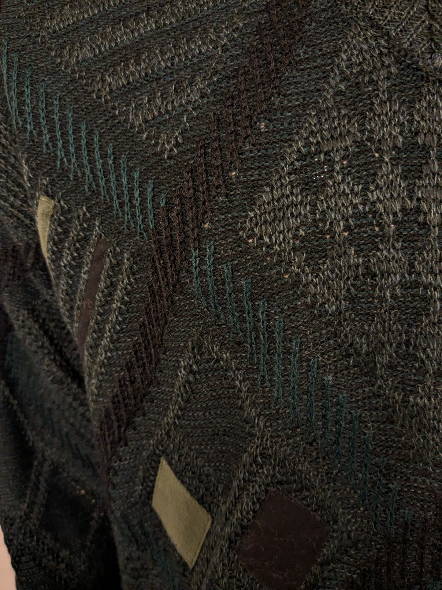 Vintage Angelo Litrico woolen sweater with V-neck. Green black colored. Size L. 8% wool.