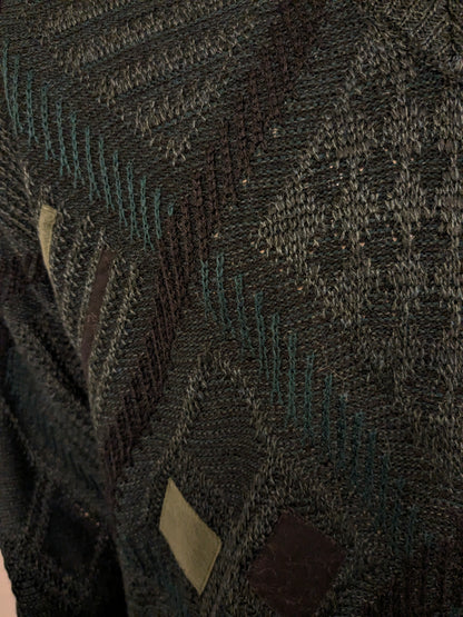 Vintage Angelo Litrico woolen sweater with V-neck. Green black colored. Size L. 8% wool.