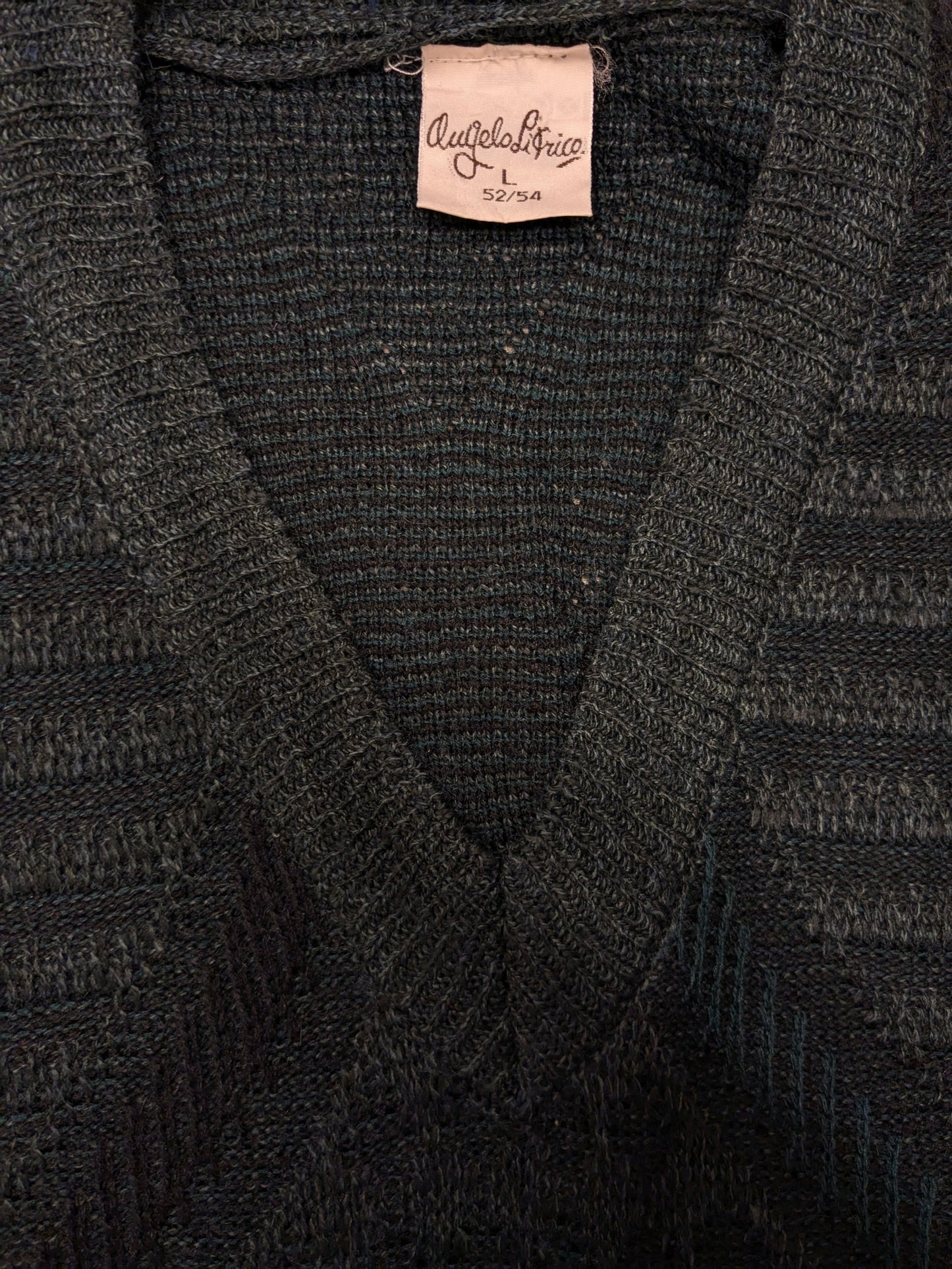 Vintage Angelo Litrico woolen sweater with V-neck. Green black colored. Size L. 8% wool.