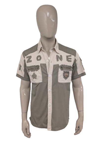 Vintage Man's Wear Goldsalon shirt short sleeve. Beige Green with applications and zippers. Size M.