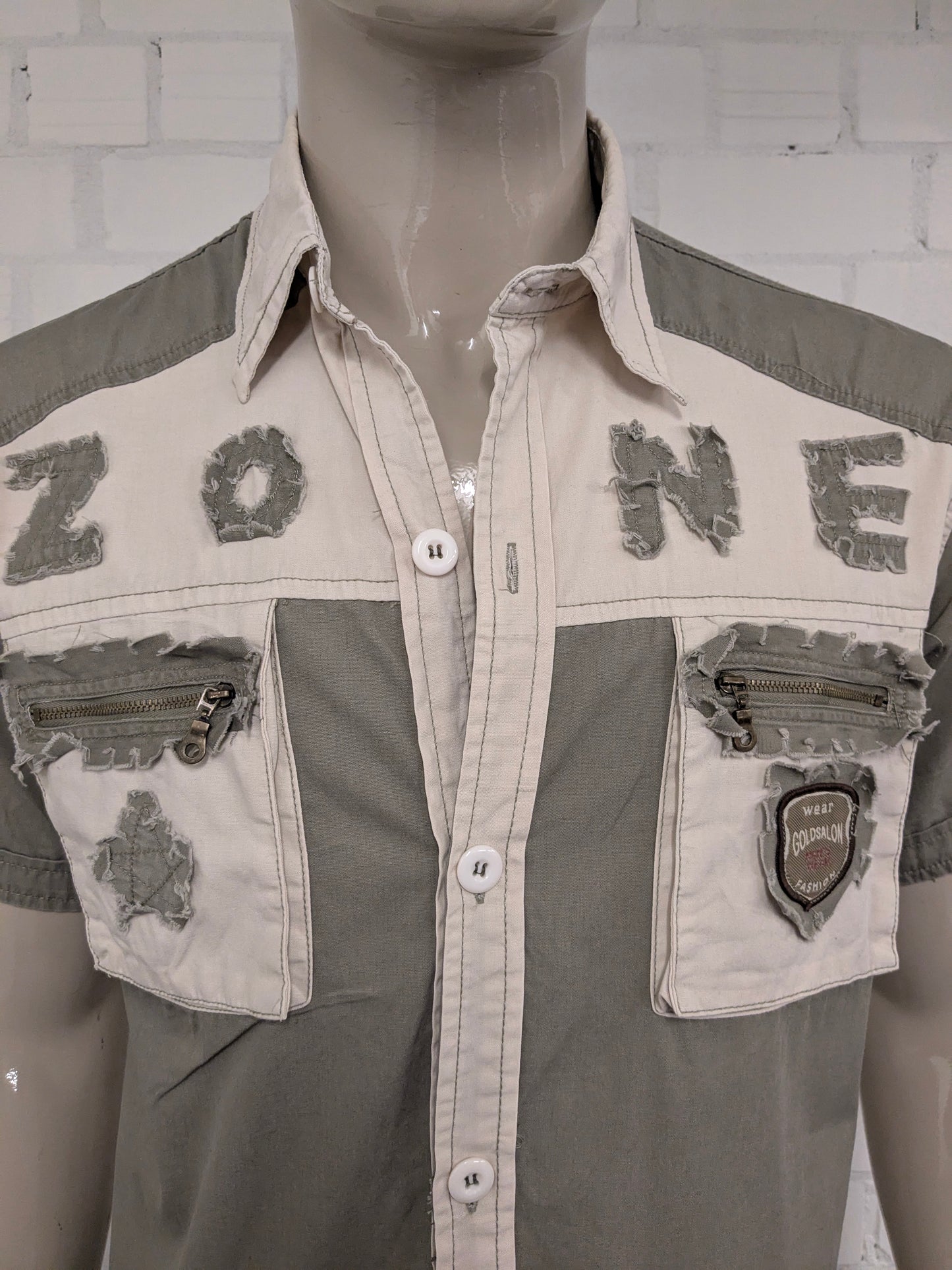Vintage Man's Wear Goldsalon shirt short sleeve. Beige Green with applications and zippers. Size M.