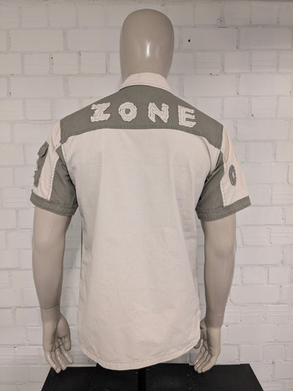 Vintage Man's Wear Goldsalon shirt short sleeve. Beige Green with applications and zippers. Size M.