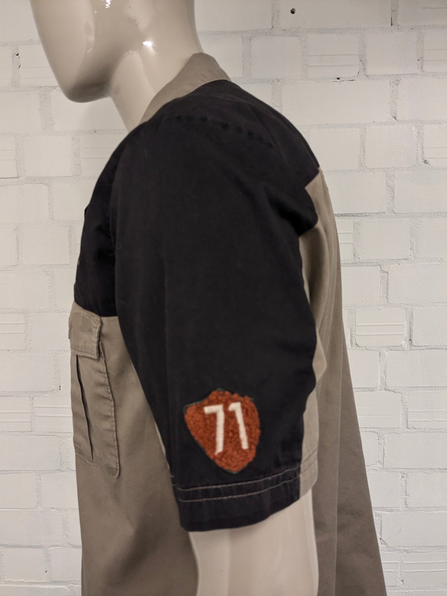 Original Hard Rock Cafe short sleeve shirt. Black Brown with applications. Size XL.