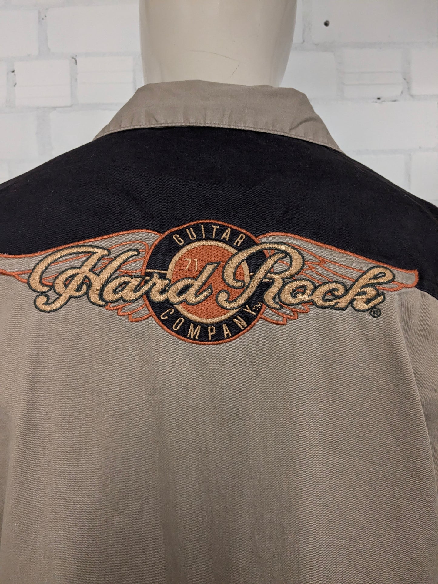 Original Hard Rock Cafe short sleeve shirt. Black Brown with applications. Size XL.