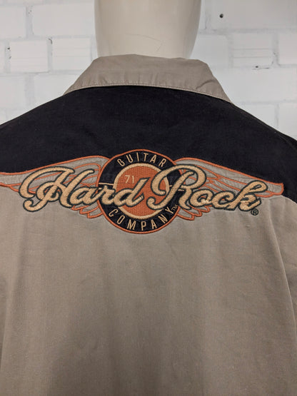 Original Hard Rock Cafe short sleeve shirt. Black Brown with applications. Size XL.
