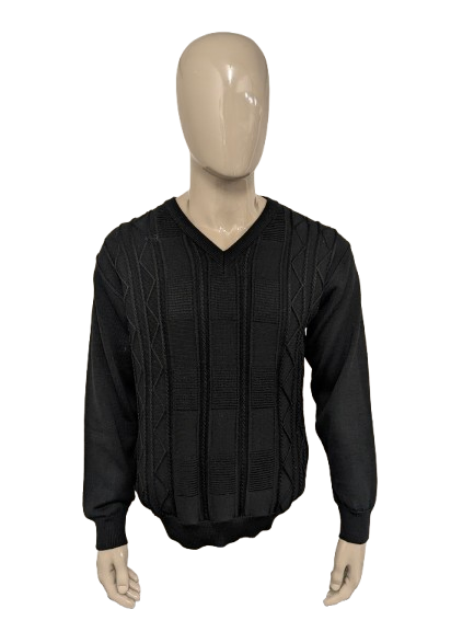 Manitobas Merino Wool sweater. Black tactile motif. Size L. 50% Wool.