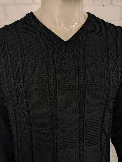 Pull en laine mérinos du Manitoba. Motif tactile noir. Taille L. 50% Laine.