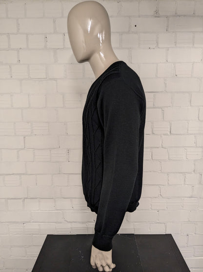 Pull en laine mérinos du Manitoba. Motif tactile noir. Taille L. 50% Laine.
