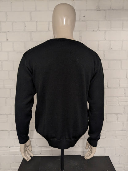 Pull en laine mérinos du Manitoba. Motif tactile noir. Taille L. 50% Laine.