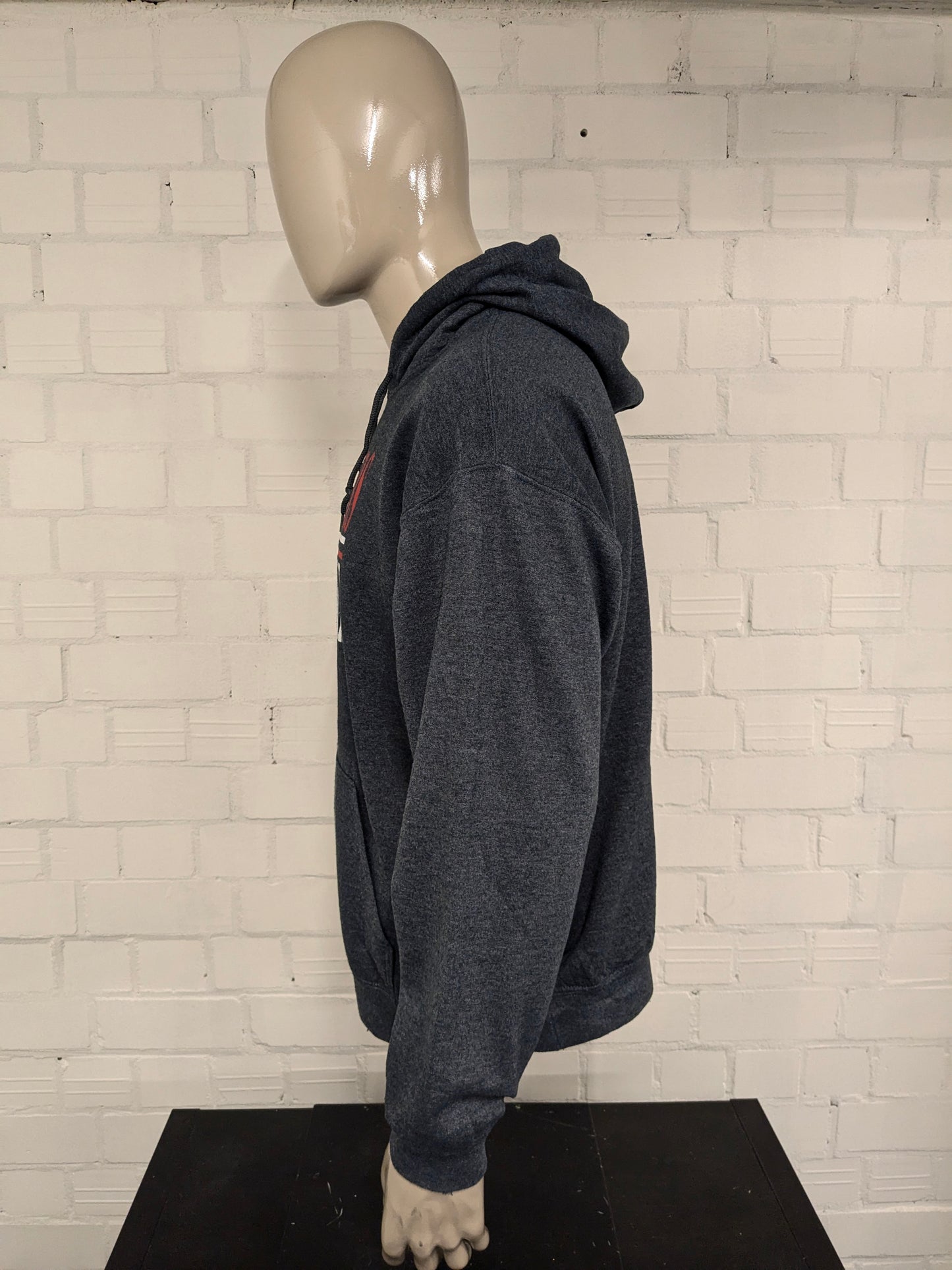 Defenders Football hoodie. Donker Grijs gemêleerd met opdruk. Maat XL.