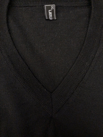 Top Man Woolen sweater with V-neck. Colored black. Size M. 100% Wool.