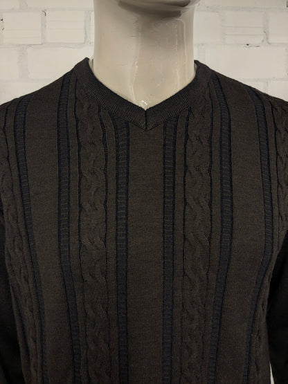 Pull Bartlett & Walker en laine mérinos avec col en V. De couleur marron bleu foncé. Taille L. 34% Laine.