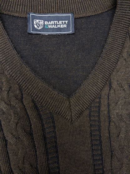 Pull Bartlett & Walker en laine mérinos avec col en V. De couleur marron bleu foncé. Taille L. 34% Laine.