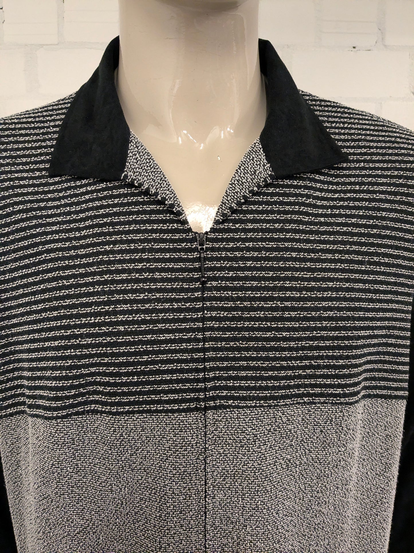 Vintage Canda cardigan with zipper. Black and white colored. Size XL.