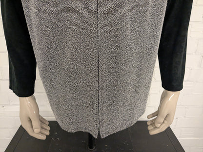 Vintage Canda cardigan with zipper. Black and white colored. Size XL.