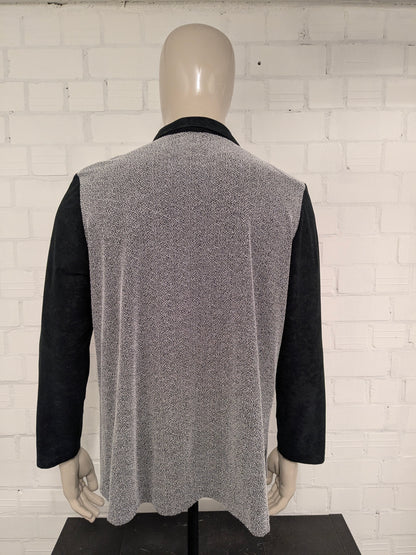 Vintage Canda cardigan with zipper. Black and white colored. Size XL.