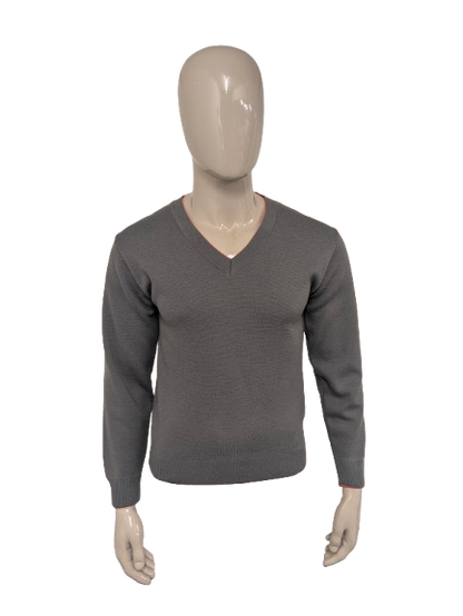 Maglione vintage Celexta in lana con scollo a V. Colore grigio arancio. Taglia S. 50% Lana.