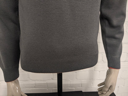 Maglione vintage Celexta in lana con scollo a V. Colore grigio arancio. Taglia S. 50% Lana.