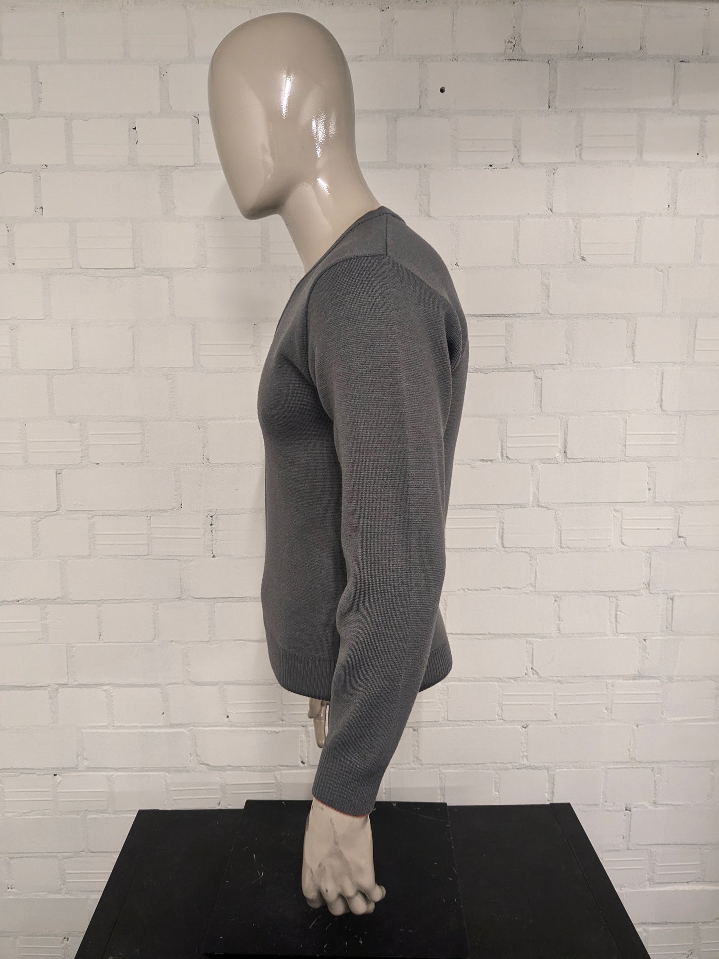 Maglione vintage Celexta in lana con scollo a V. Colore grigio arancio. Taglia S. 50% Lana.