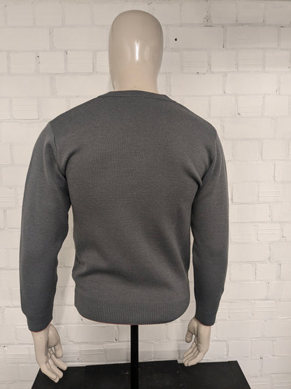 Maglione vintage Celexta in lana con scollo a V. Colore grigio arancio. Taglia S. 50% Lana.