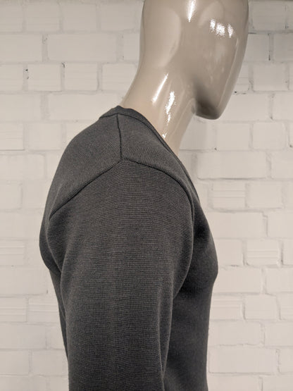 Maglione vintage Celexta in lana con scollo a V. Colore grigio arancio. Taglia S. 50% Lana.