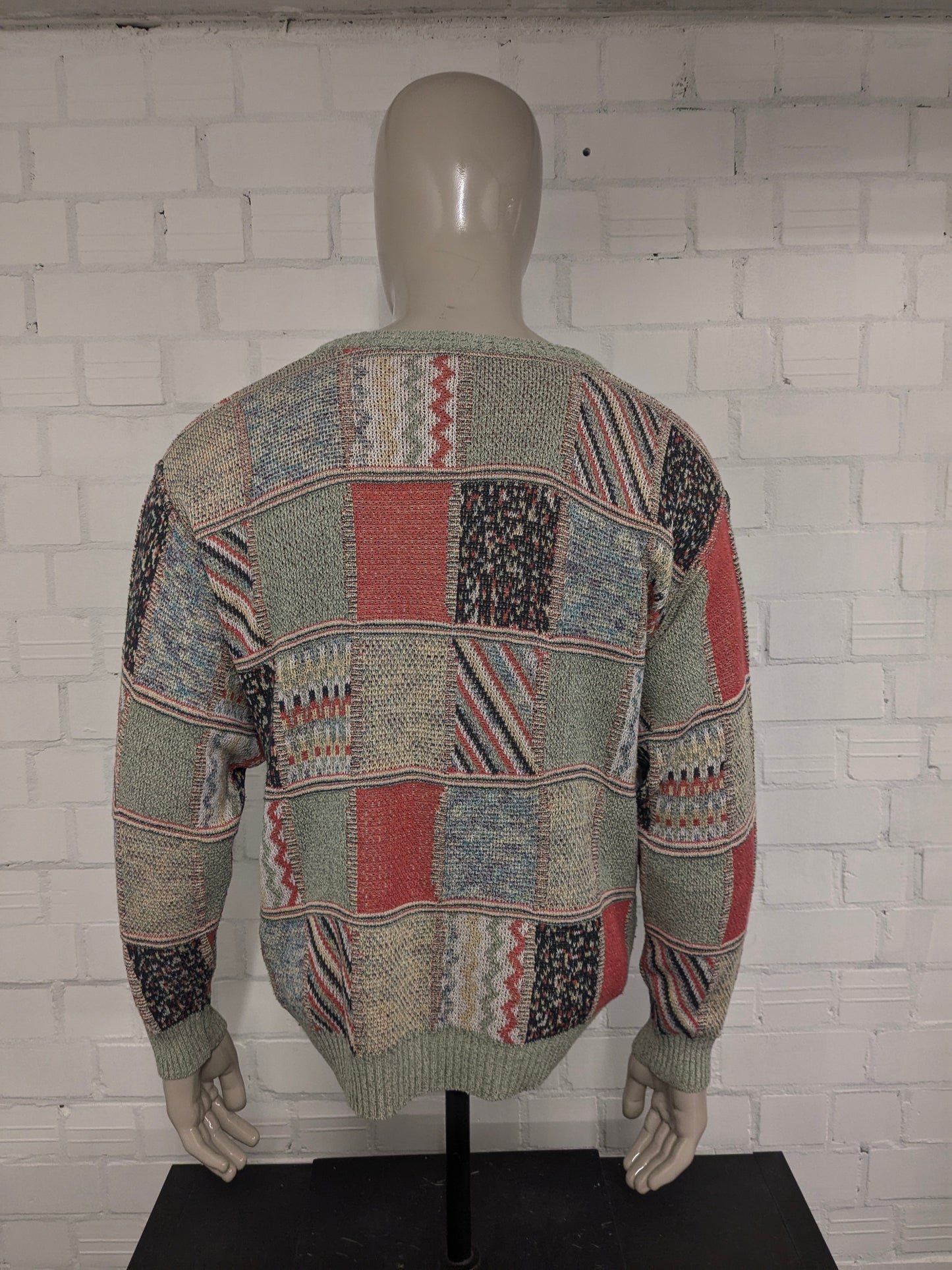 Maglione vintage Monte Carlo con scollo a V. Motivo colorato. Taglia L.